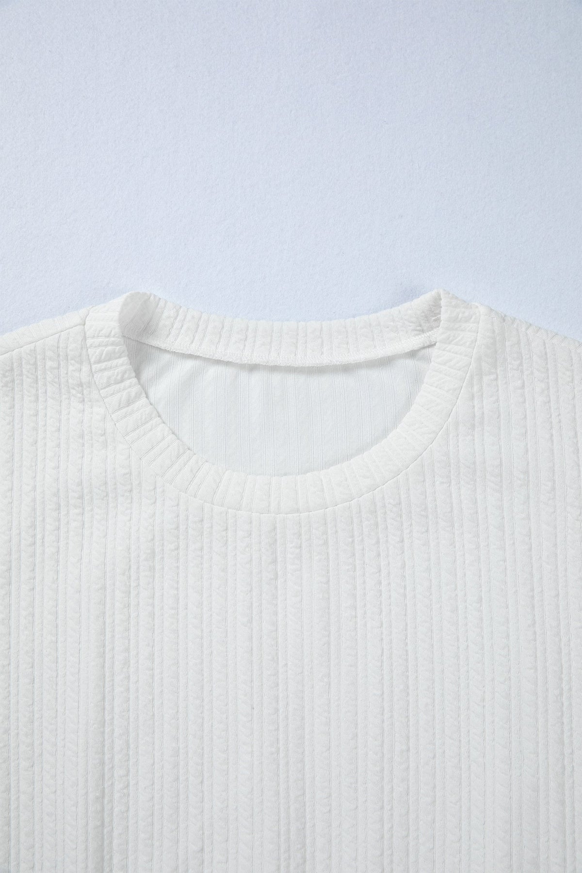 Solid Textured Drop Shoulder Peplum Top
