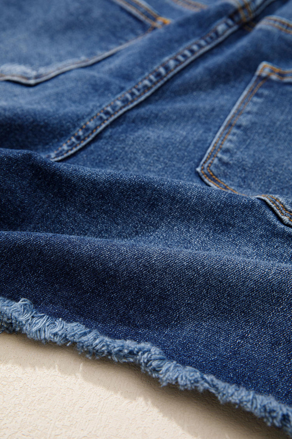 Distressed Denim Asymmetric Raw Hem Shorts