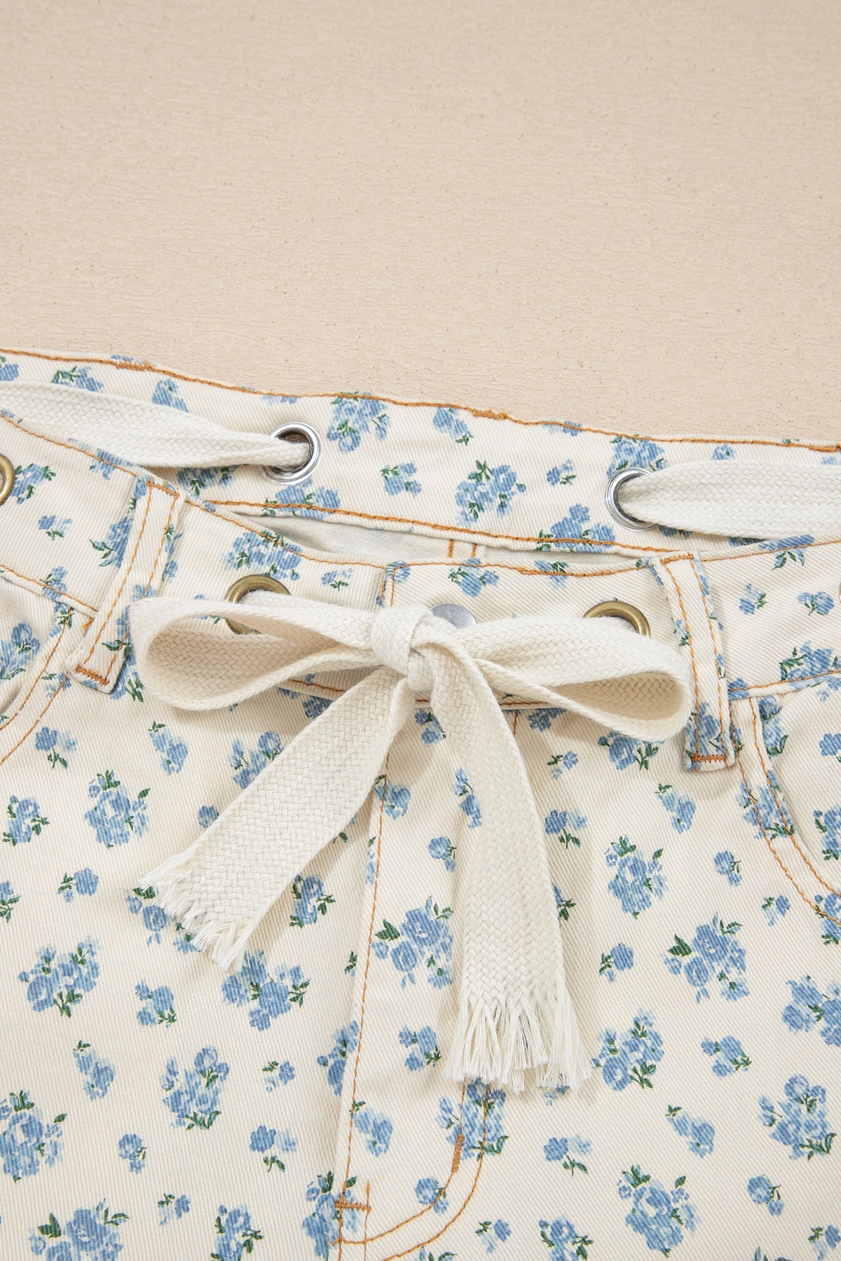 Floral Grommet Knot Waist Barrel Leg Jeans