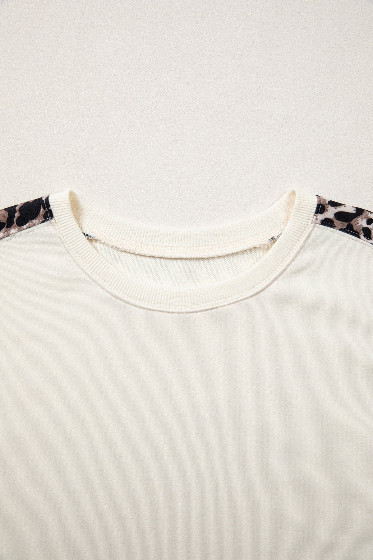 Leopard Patchwork Uneven Hem Short Sleeve Top