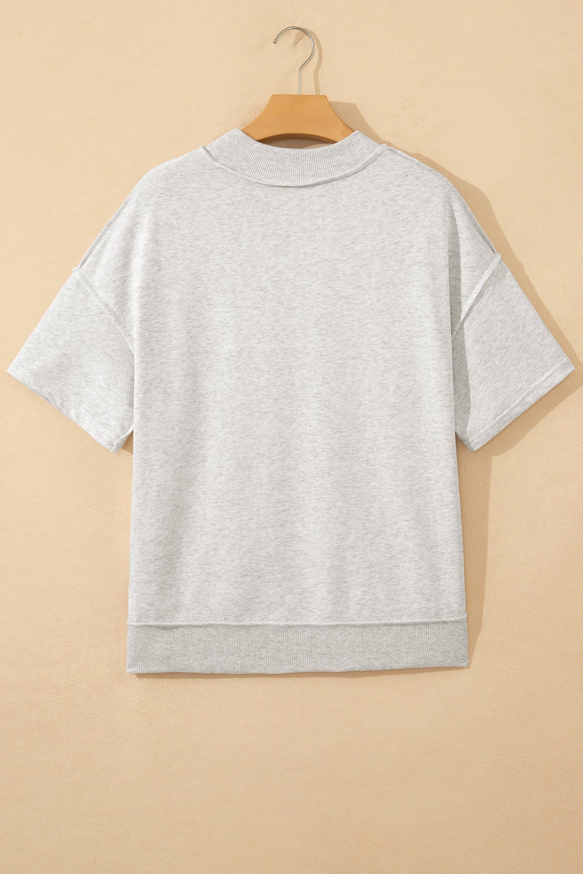 Solid Exposed Seam Mock Neck Tee